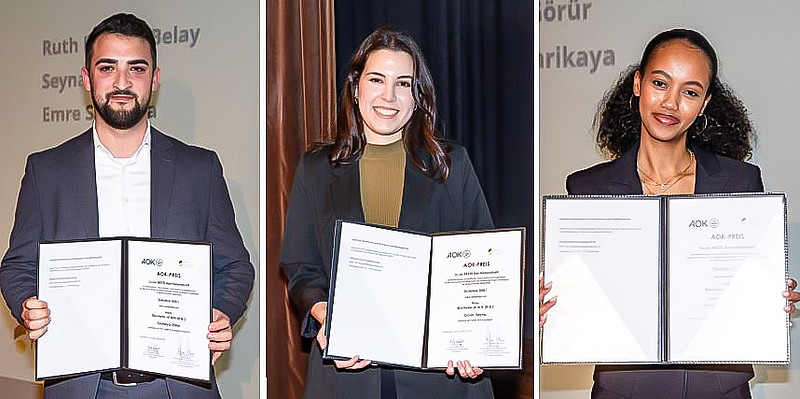 Die drei Preisträger mit ihren Urkunden